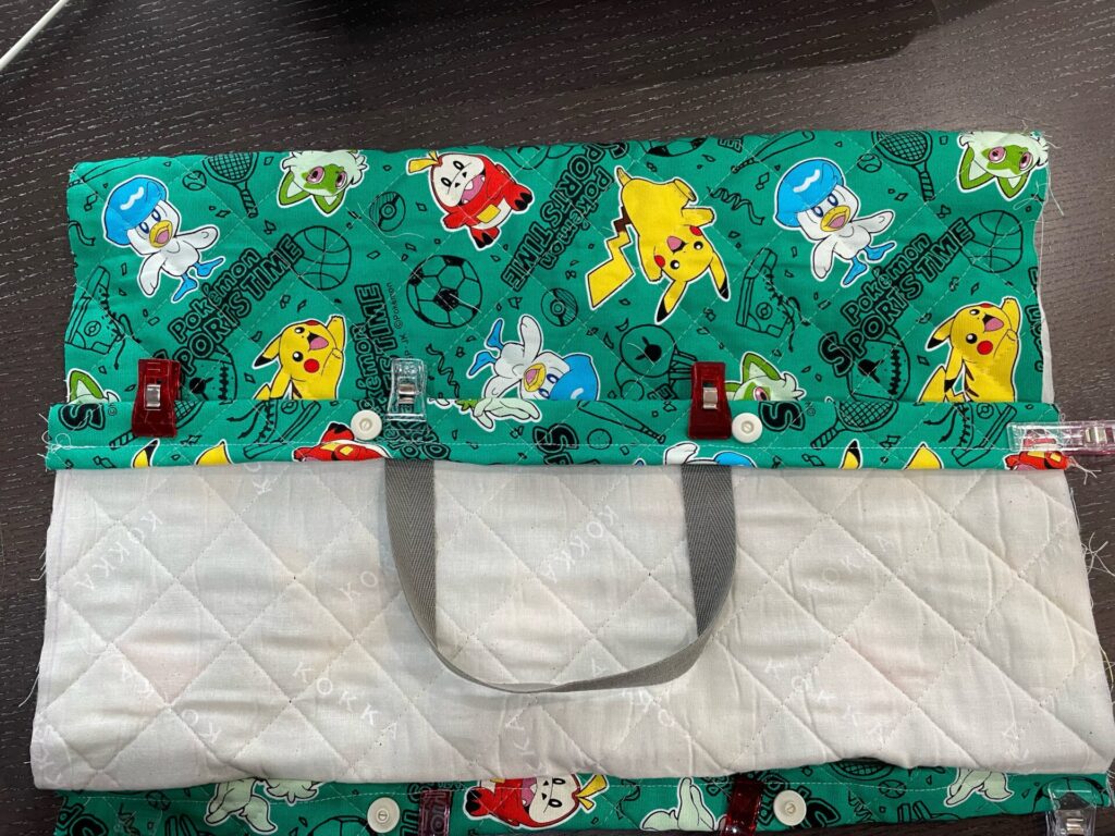 持ち手を挟む