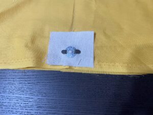 金具を倒す