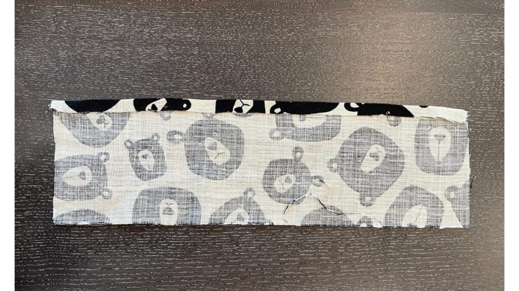 柄布の上、1cmおる