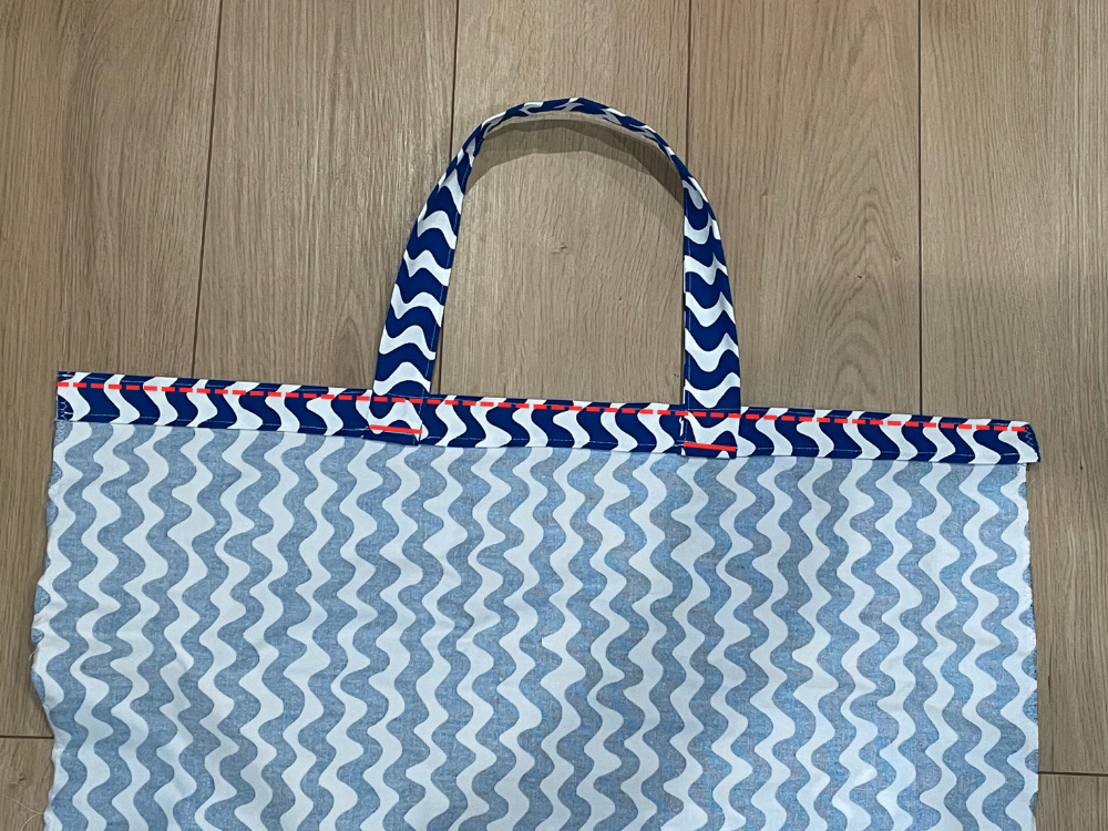 布入れ口にミシンをかける